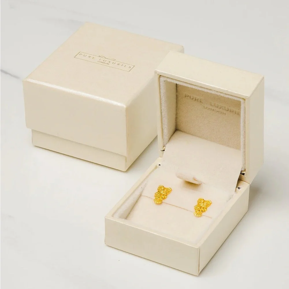 Pure Luxuries London owl earrings